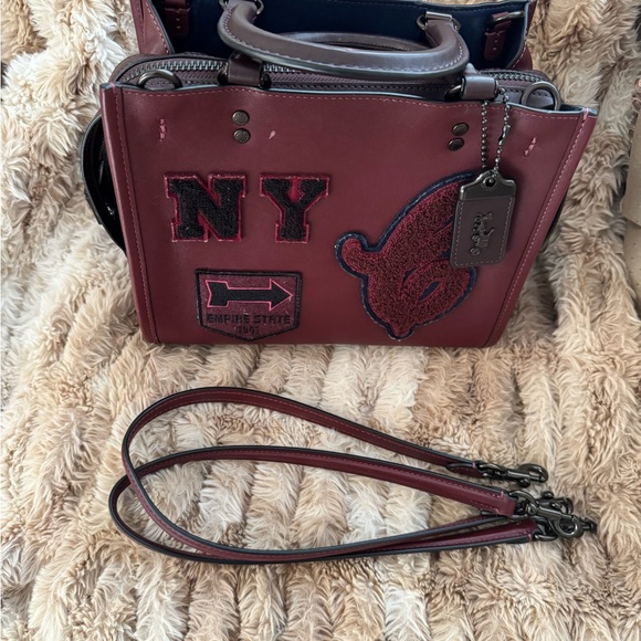 Coach Handbags - Coach Rogue 25 With Varsity Patches worn once LIKE NEW
